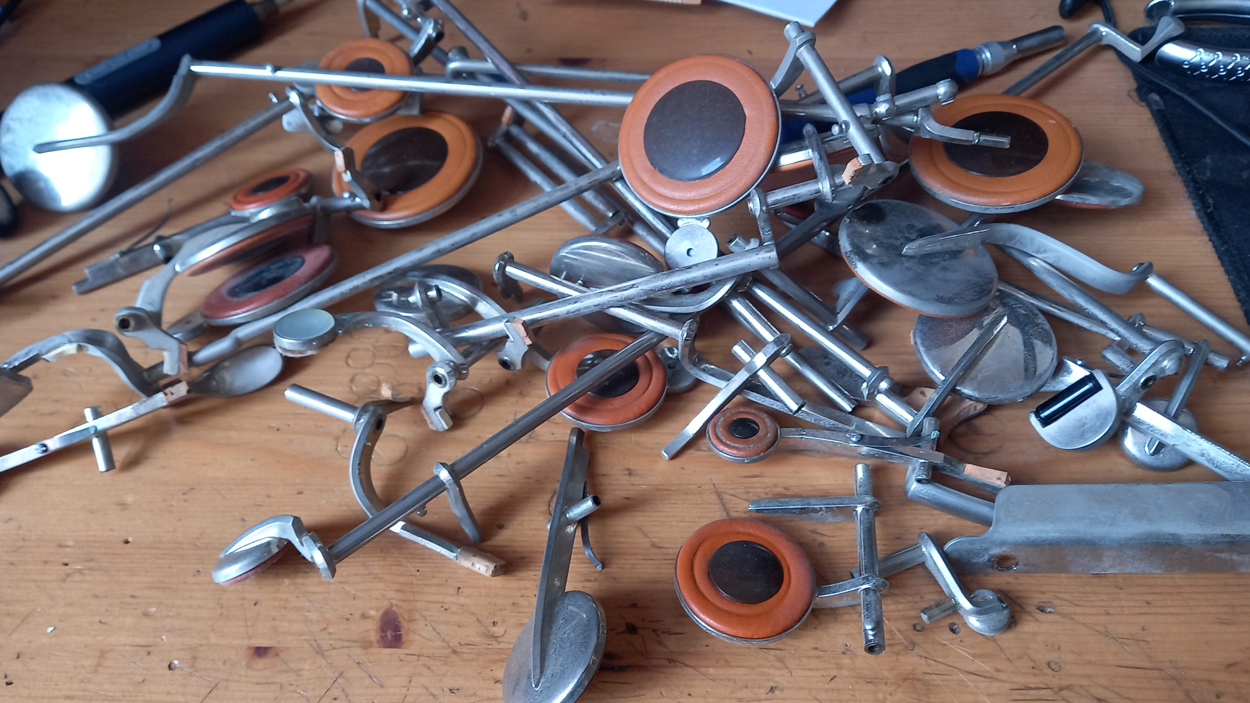 Saxophone parts on workbench